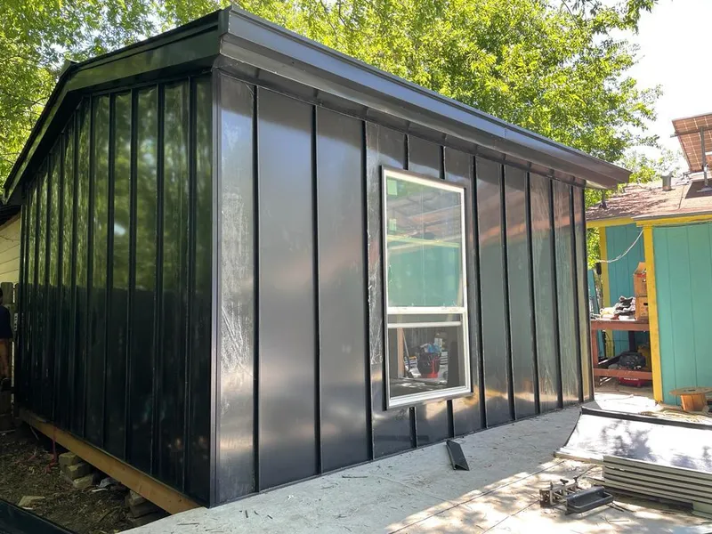 Black standing seam metal wall panels for Metal Roof Installation in Sturgis